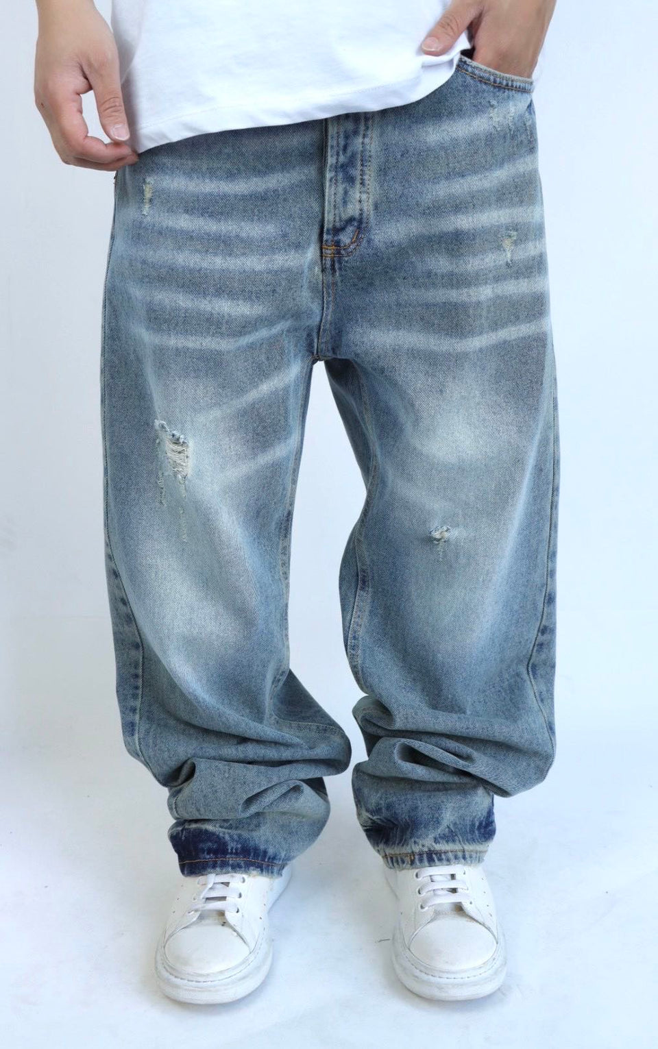 Jeans baggy denim con rotture uomo